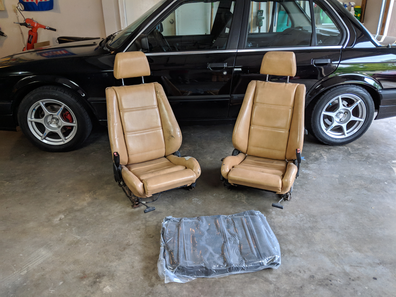 The second-hand sport seats awaiting new leather.